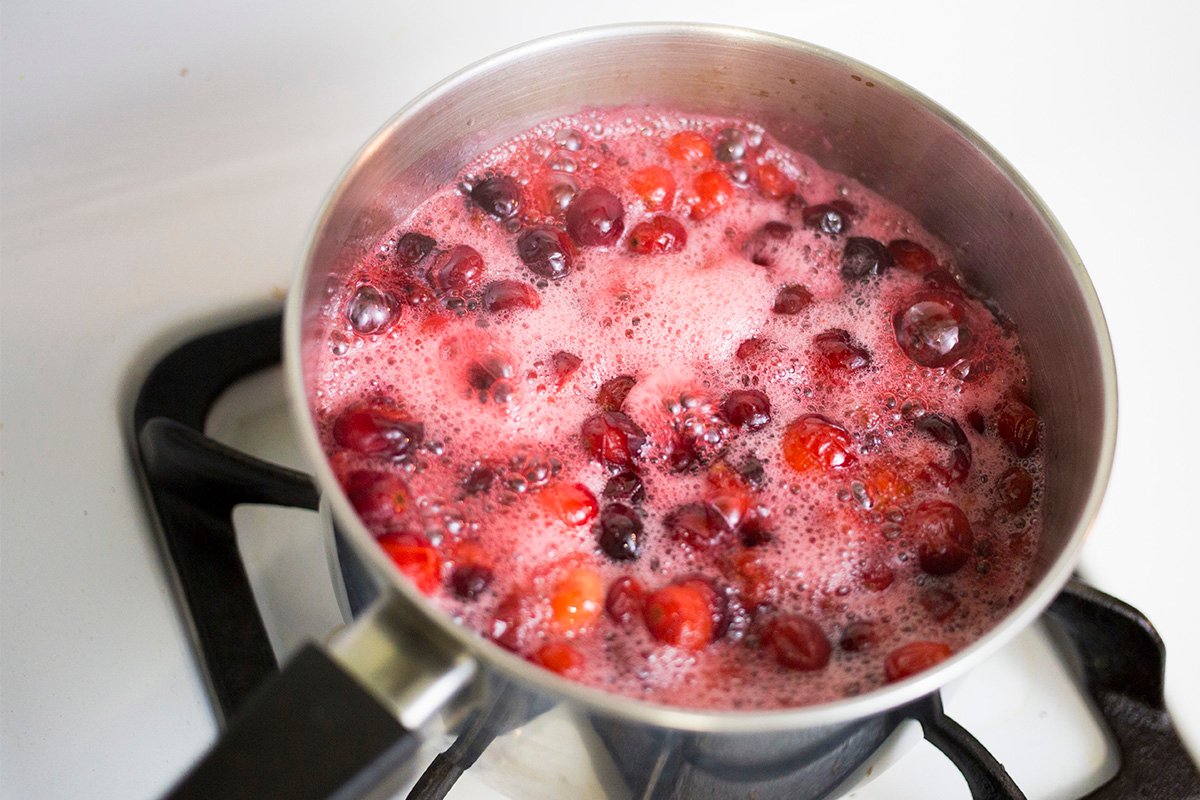 Bringing cranberry mixture to a boil.